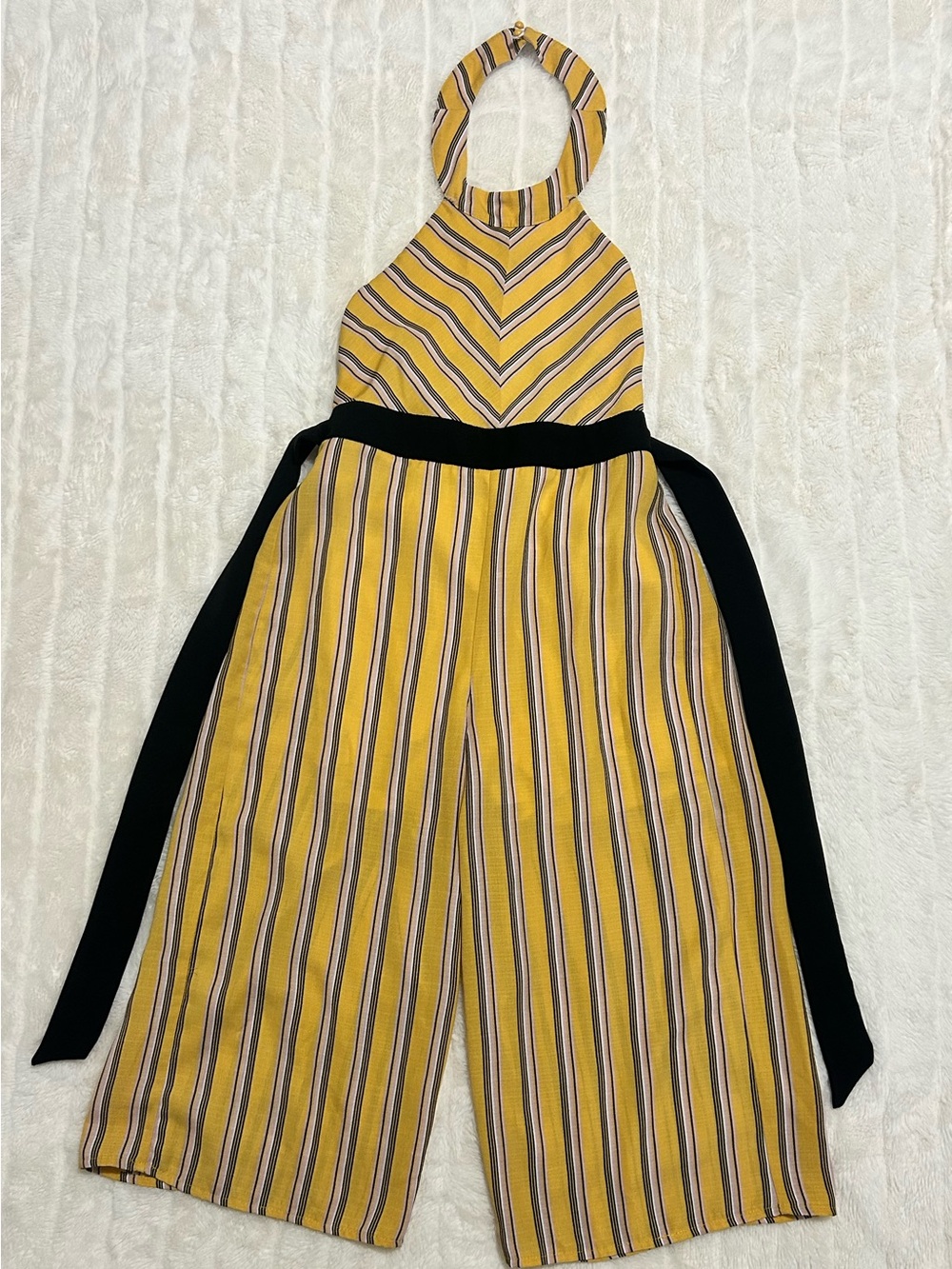 Striped Halter Wide-Leg Jumpsuit in Yellow and white/black stripes.